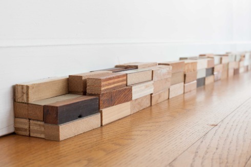 Wandleiste. "40 ft. Shipping Containers (intermodal), 2017. Assorted leftover wood and surface from CPS and infinite Games projects" von Dan Petermann<br />