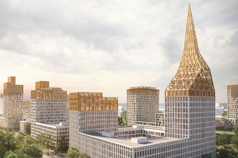 Visualisierungen des großen Stadtquartiers mit goldenen Aufbauten und Türmen. Einige Blocks am Hafen für Fähr- und Kreuzfahrtschiffe sind bereits in Bau.<br />
