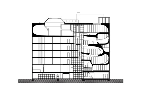 Im Neubau werden die gekrümmten Wände und Decken zur Suggestion von Bewegung genutzt.<br />