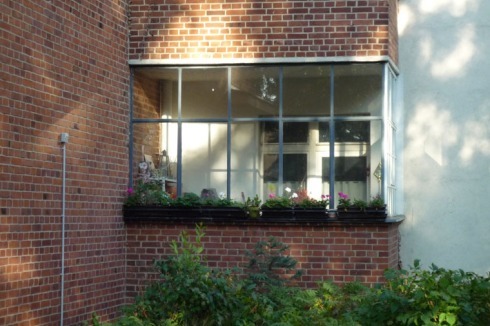 Nutzung der solaren Wärmegewinne: Wintergarten in der Taut-Siedlung Schillerpark in Berlin<br />